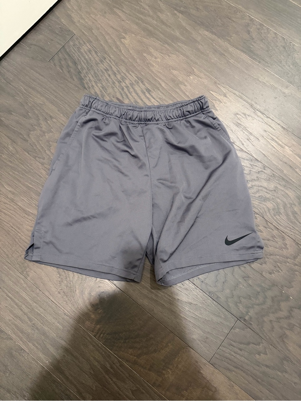 Nike Men's Gray Athletic Training Shorts with Black Swoosh